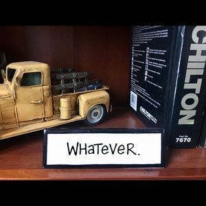 “Whatever.” Desk plaque by Lorrie Veasey.